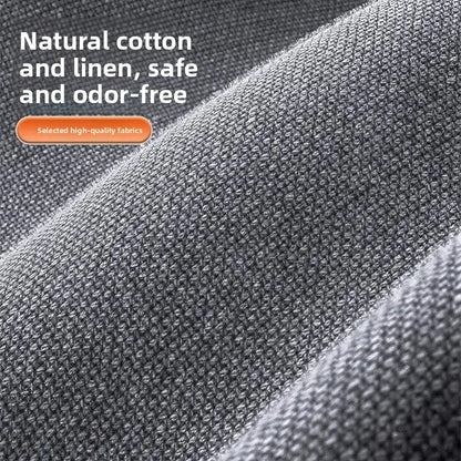 Close-up of gray fabric with text about natural cotton and linen safety.