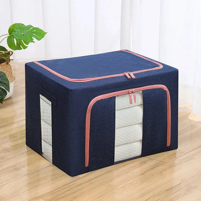 Navy storage box with pink zipper on a wooden floor