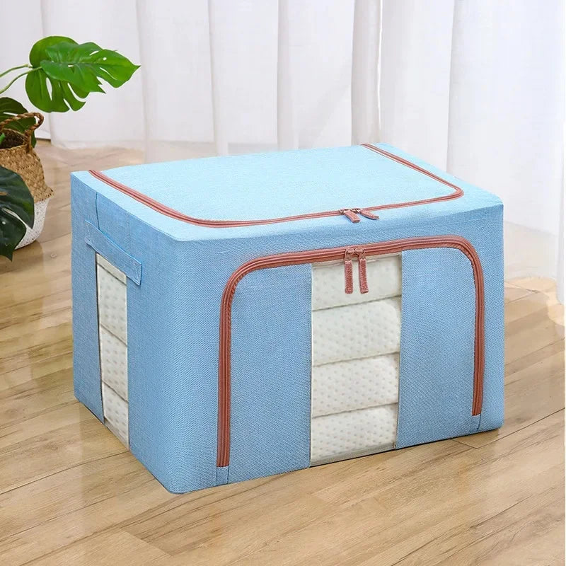Blue storage bag with brown zipper on a wooden floor