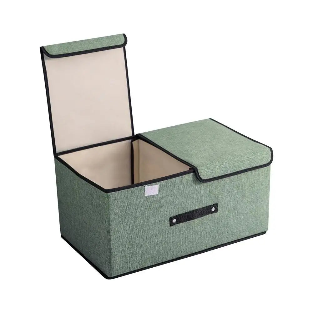 Green storage ottoman with beige interior on a white background