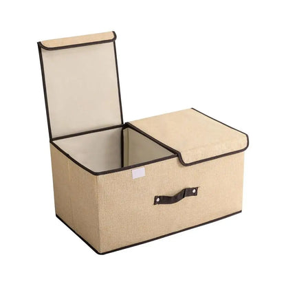 Beige storage trunk with a black handle on a white background