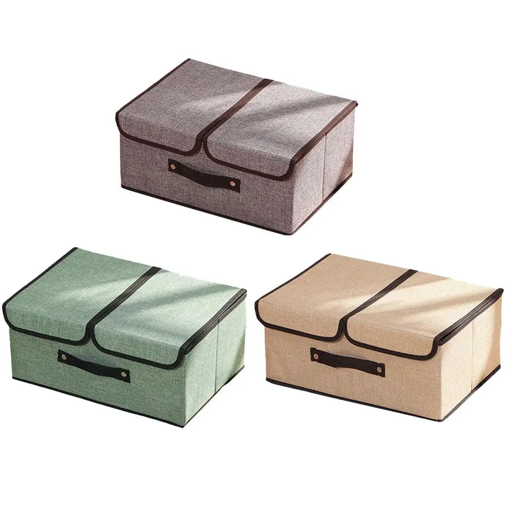 Three storage boxes in gray, green, and beige on a white background