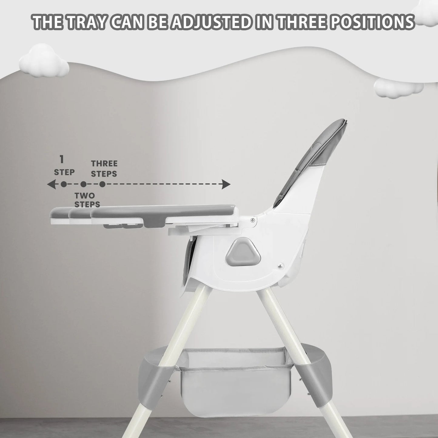 High chair with adjustable tray on a plain background