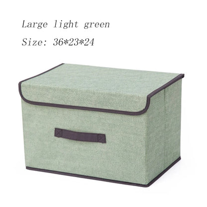 Light green storage box with a dark brown handle on a white background
