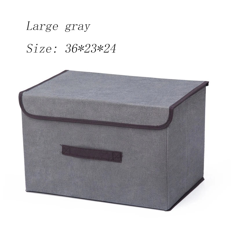 Gray storage box with a brown handle on a white background