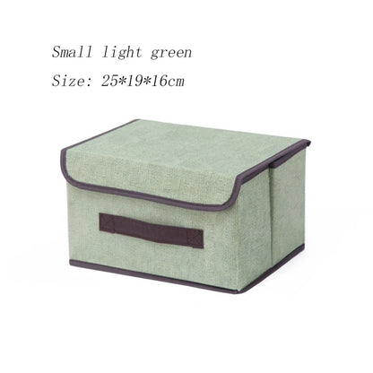 Light green storage box with brown trim on a white background