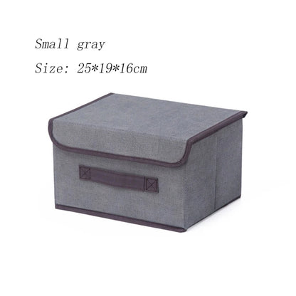 Small gray storage box with a brown handle on a white background