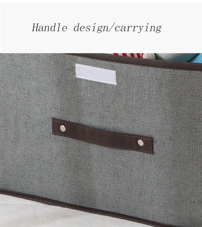 Gray bag with a leather handle on a white background