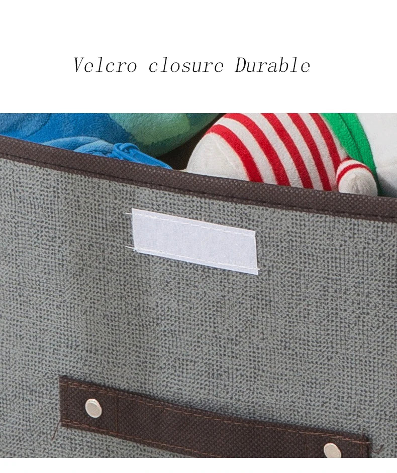 Gray storage bin with brown Velcro closure and visible label, containing colorful socks.