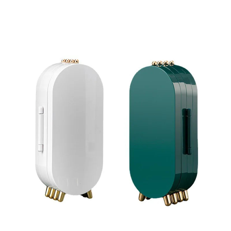 White and teal electronic devices with gold accents on a white background