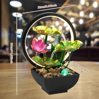 Decorative water fountain with lotus flowers and measurements on a wooden surface.