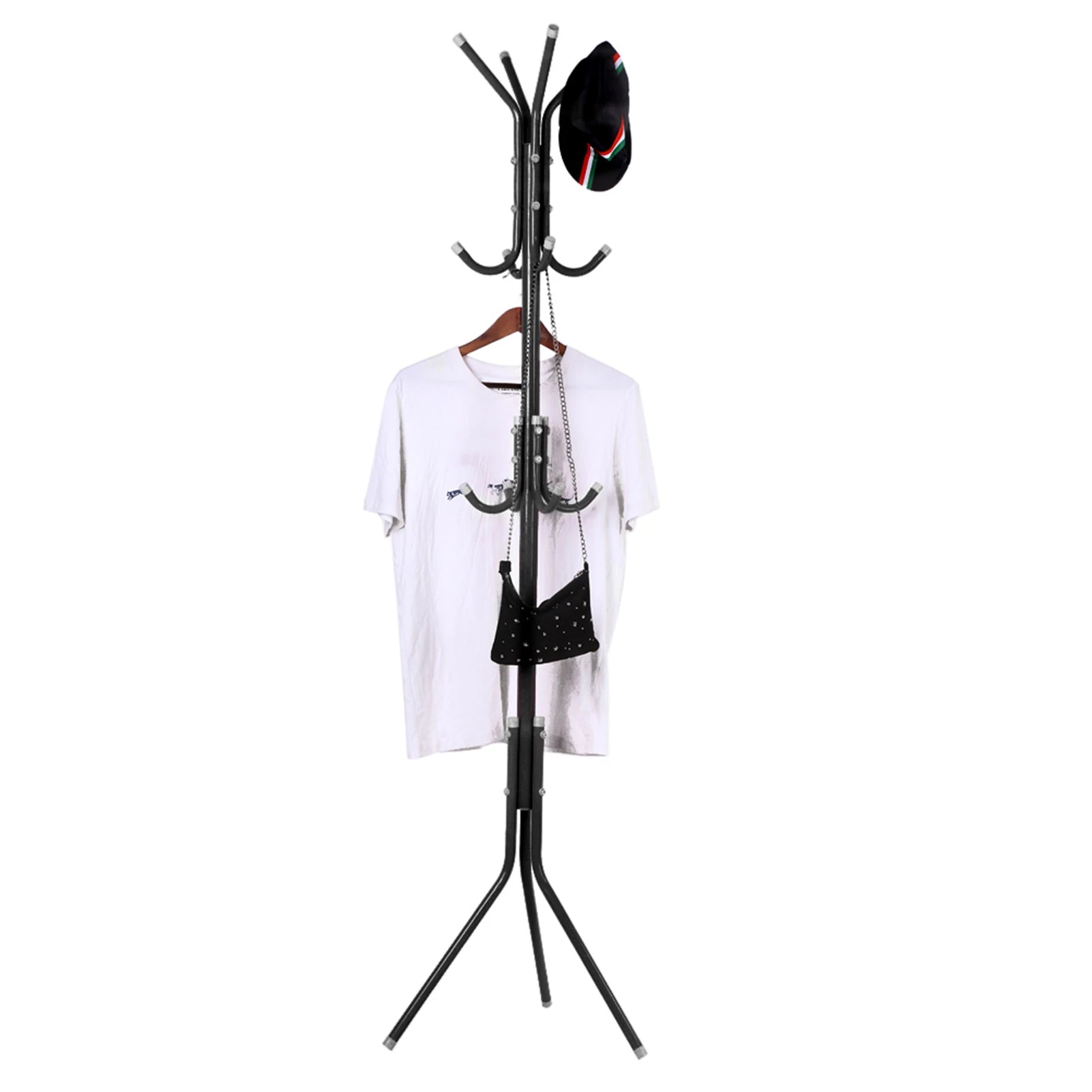 Black coat stand with a white shirt, black bag, and a hat on a white background