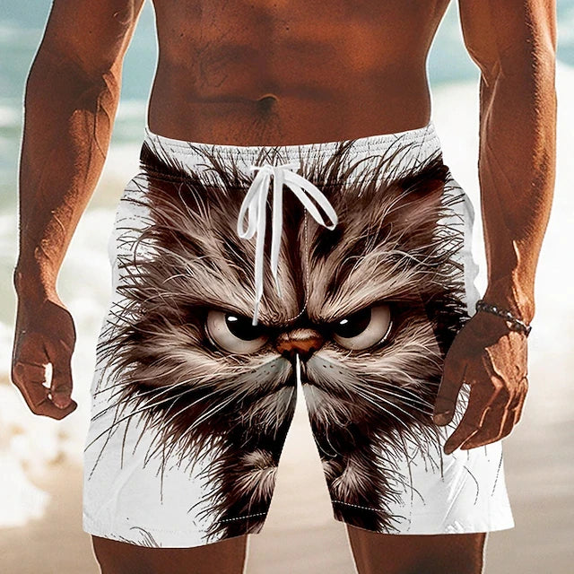 Person wearing a swimsuit with a cat-like creature design on a beach.