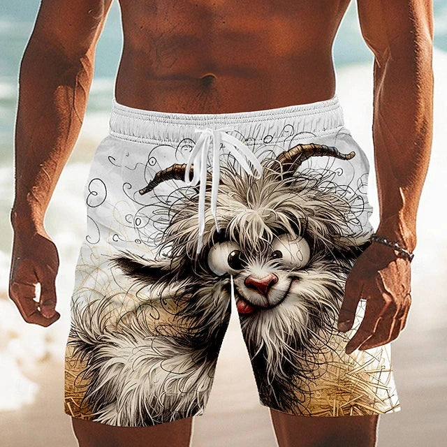 Beach shorts with a cartoon goat design worn by a person on a beach.