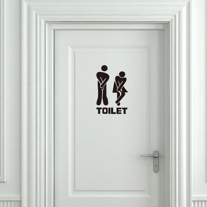 White door with black 'TOILET' and icon decal on a white background