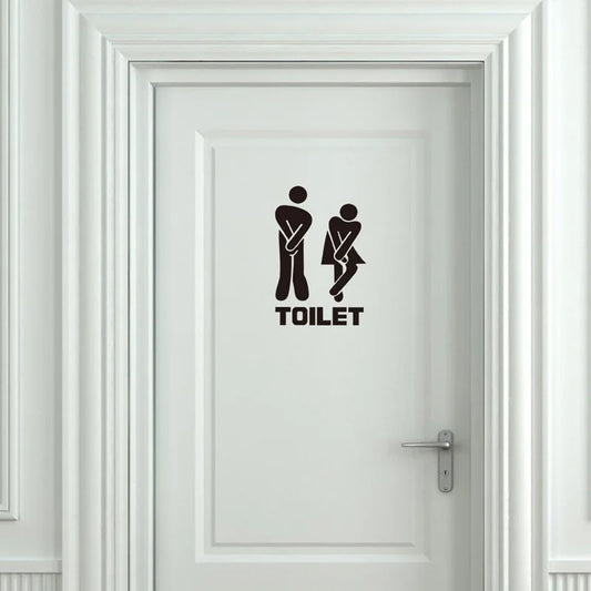 White door with black 'TOILET' and icon decal on a white background