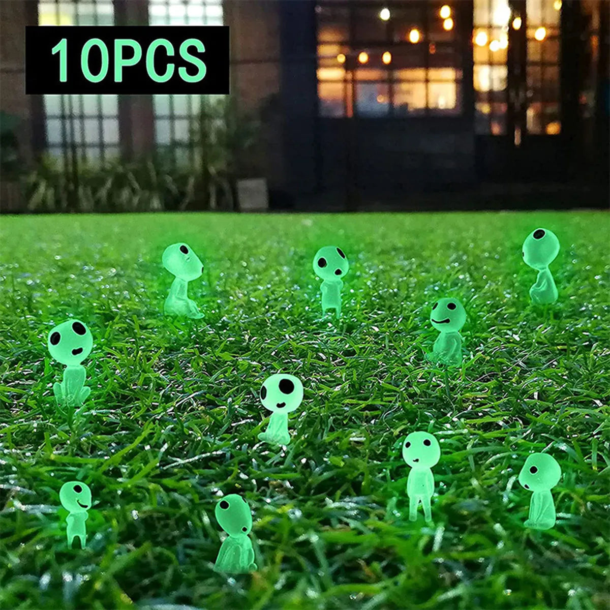 Green alien lawn ornaments on grass with '10PCS' text above.