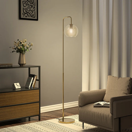 Modern living room with a floor lamp, sofa, and side table.