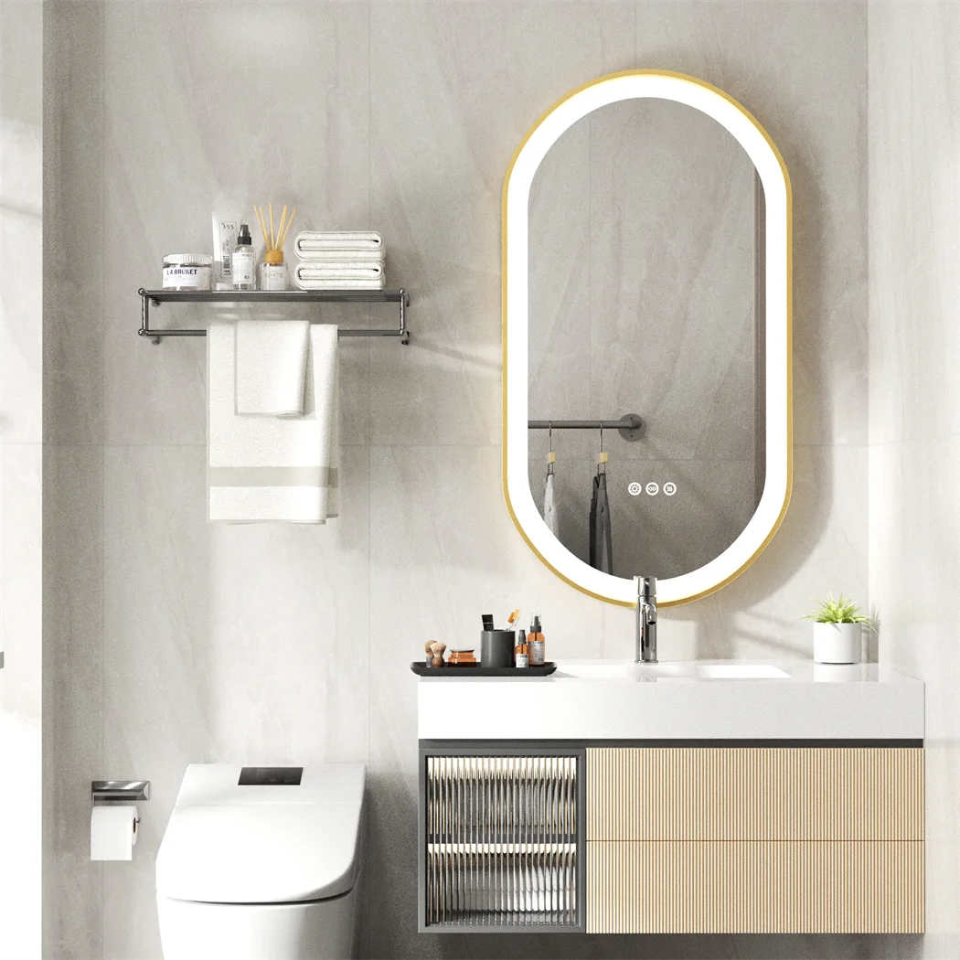 Modern bathroom with a vanity, mirror, and toilet.