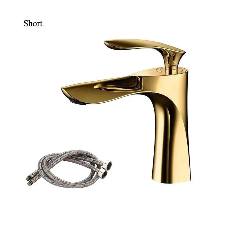 Gold faucet with flexible hose on a white background