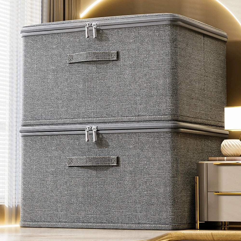 Gray storage box with zipper on a light-colored floor.