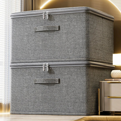 Gray storage box with zipper on a light-colored floor.