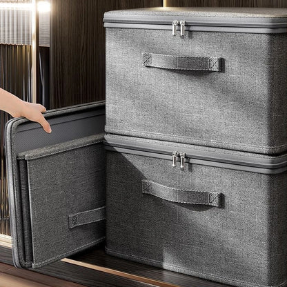 Gray storage bin with a handle on a wooden surface