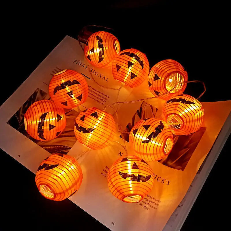 String of Halloween-themed lantern lights on a magazine
