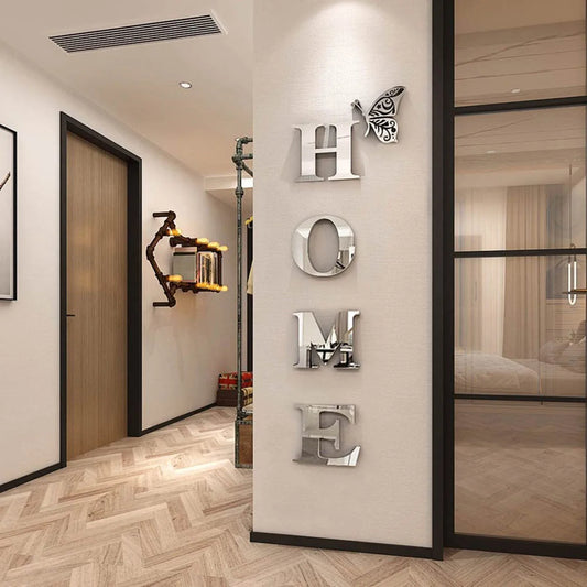 Decorative 'HOME' wall art in a modern interior setting with a mirror and door.