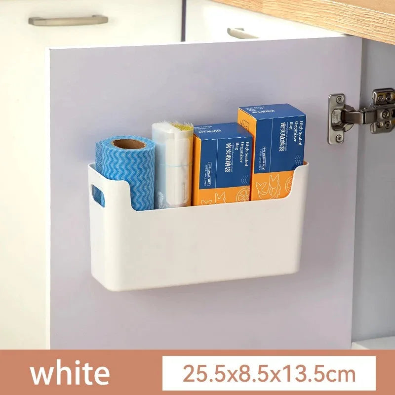 White cabinet organizer with supplies inside, attached to a kitchen cabinet.