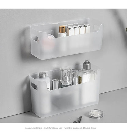 White wall-mounted storage baskets with cosmetic items on a neutral background