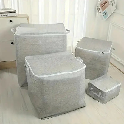 Set of gray laundry baskets on a light wooden floor.