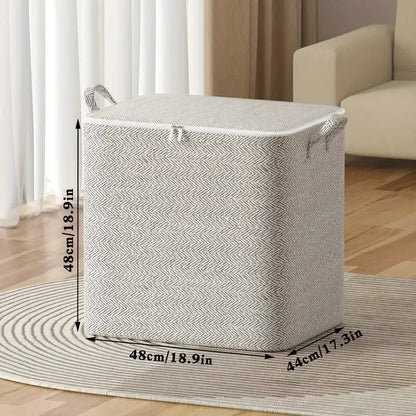 Gray laundry basket with dimensions on a wooden floor in a living room setting