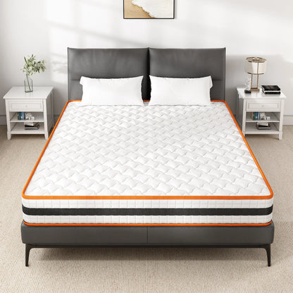 Mattress on a bed in a bedroom setting with nightstands and decor.