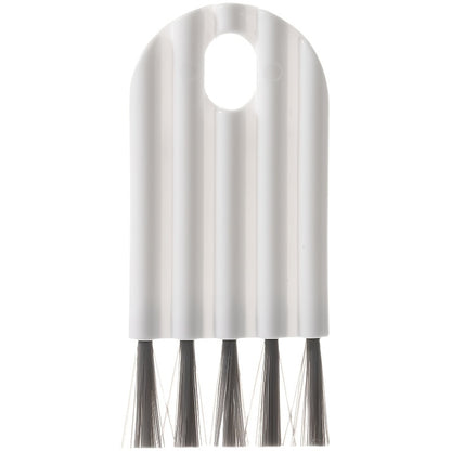 Metallic brush with bristles on a white background