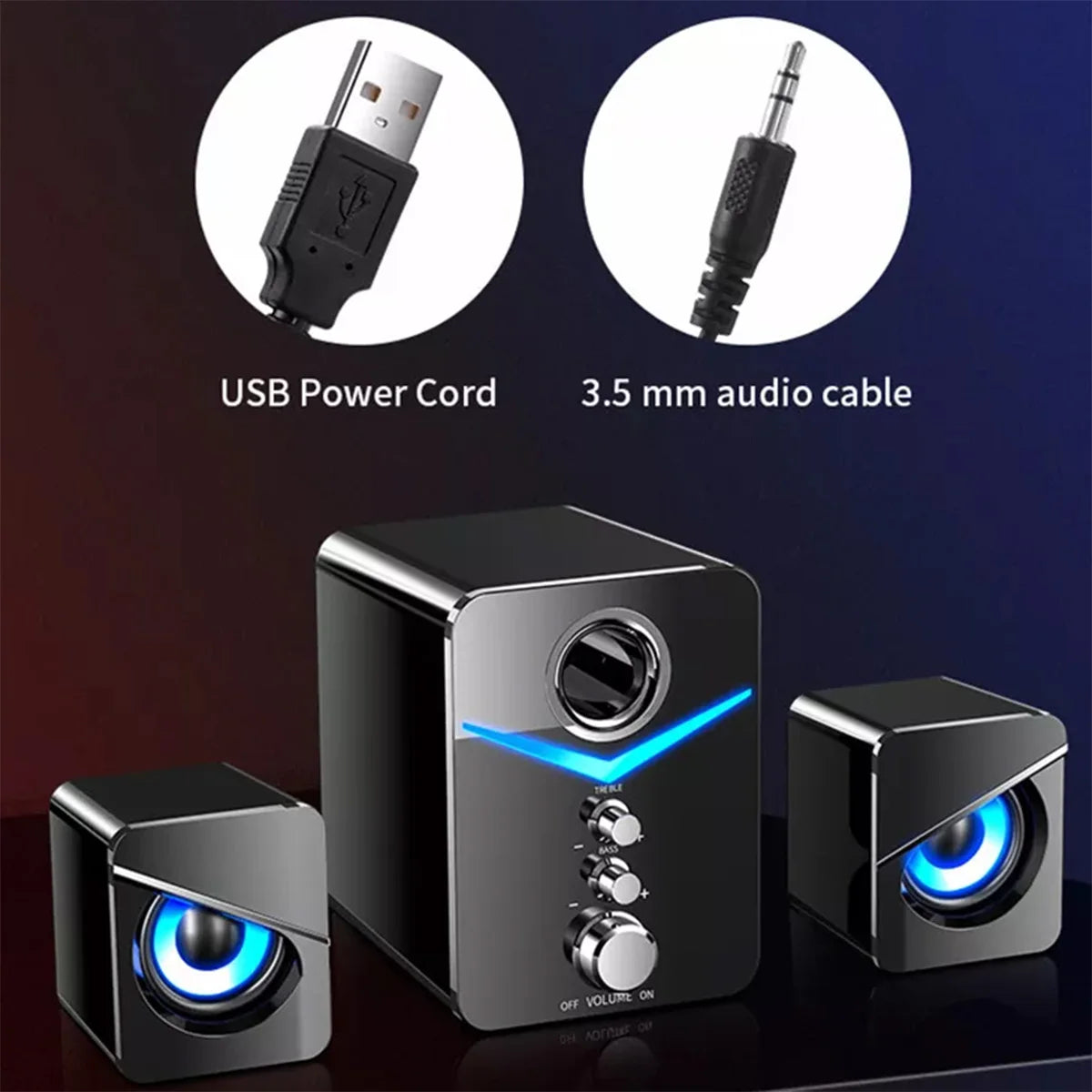 Black speaker system with USB power cord and 3.5 mm audio cable on a dark background