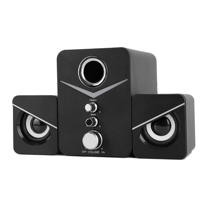 Black computer speakers with control buttons on a white background