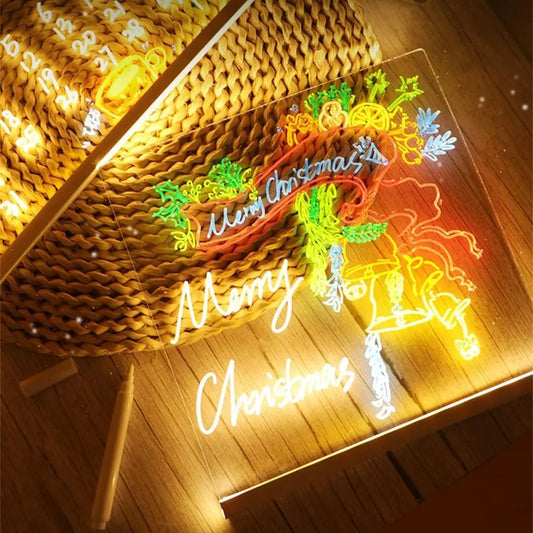 Neon sign with 'Merry Christmas' text on a wooden surface