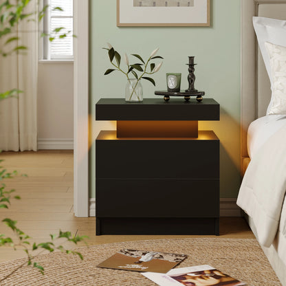 Black nightstand with decorative items in a bedroom setting