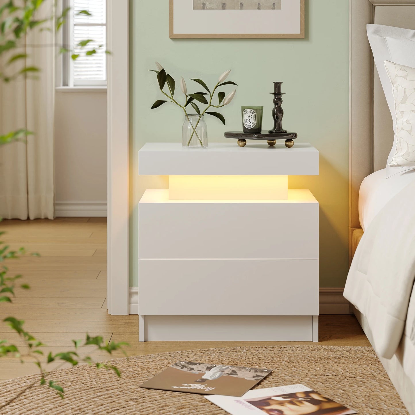 White nightstand with LED lighting in a bedroom setting