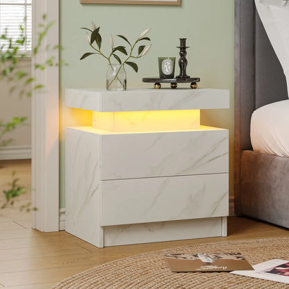 Modern nightstand with marble design and LED lighting in a bedroom setting.