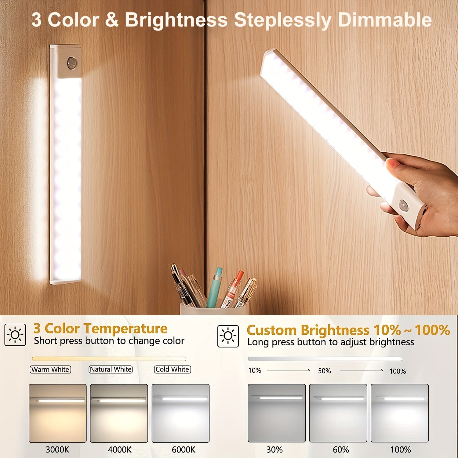 Hand holding a dimmable LED light bar with color and brightness controls on a wooden surface.