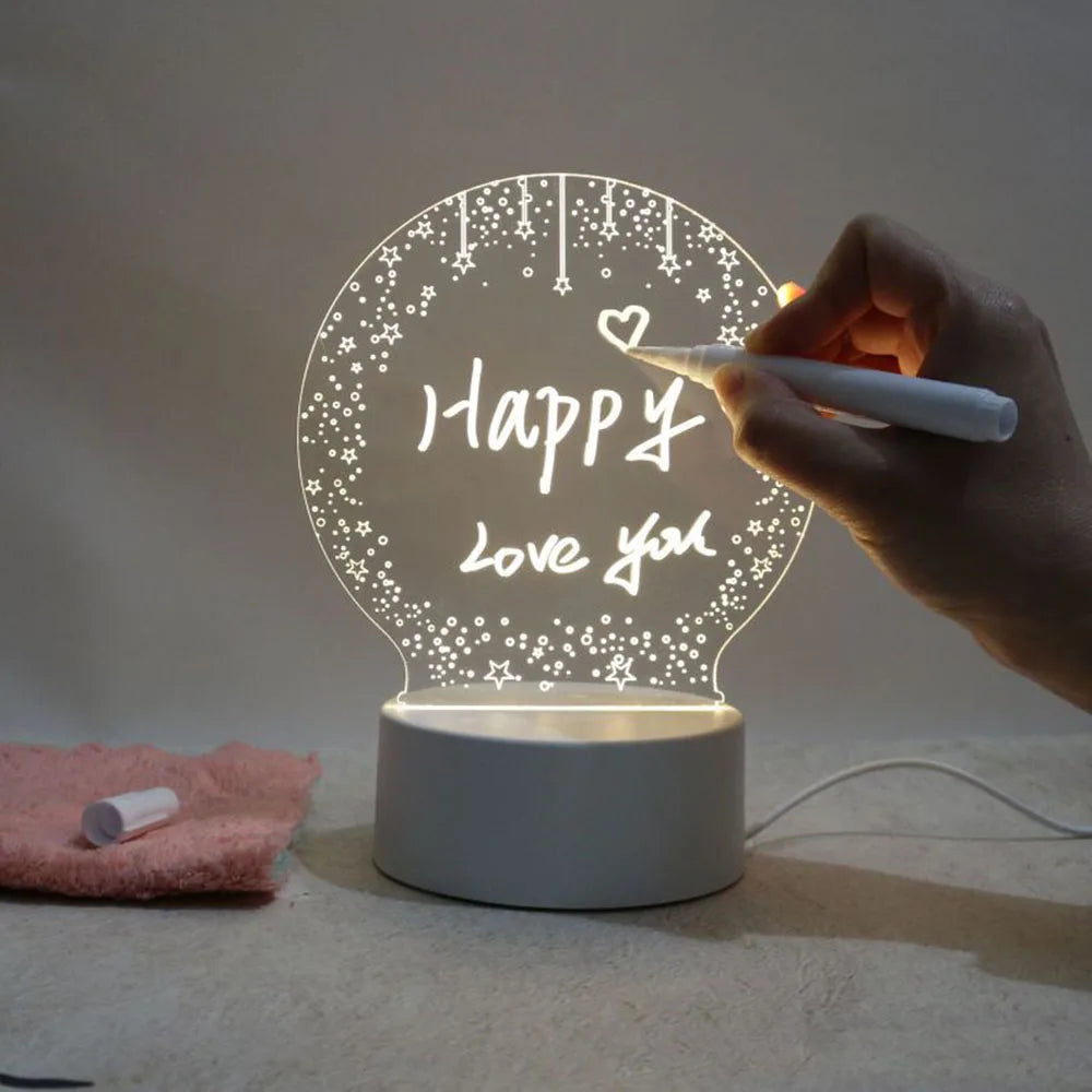 Hand writing 'Happy Love You' on a glowing night light