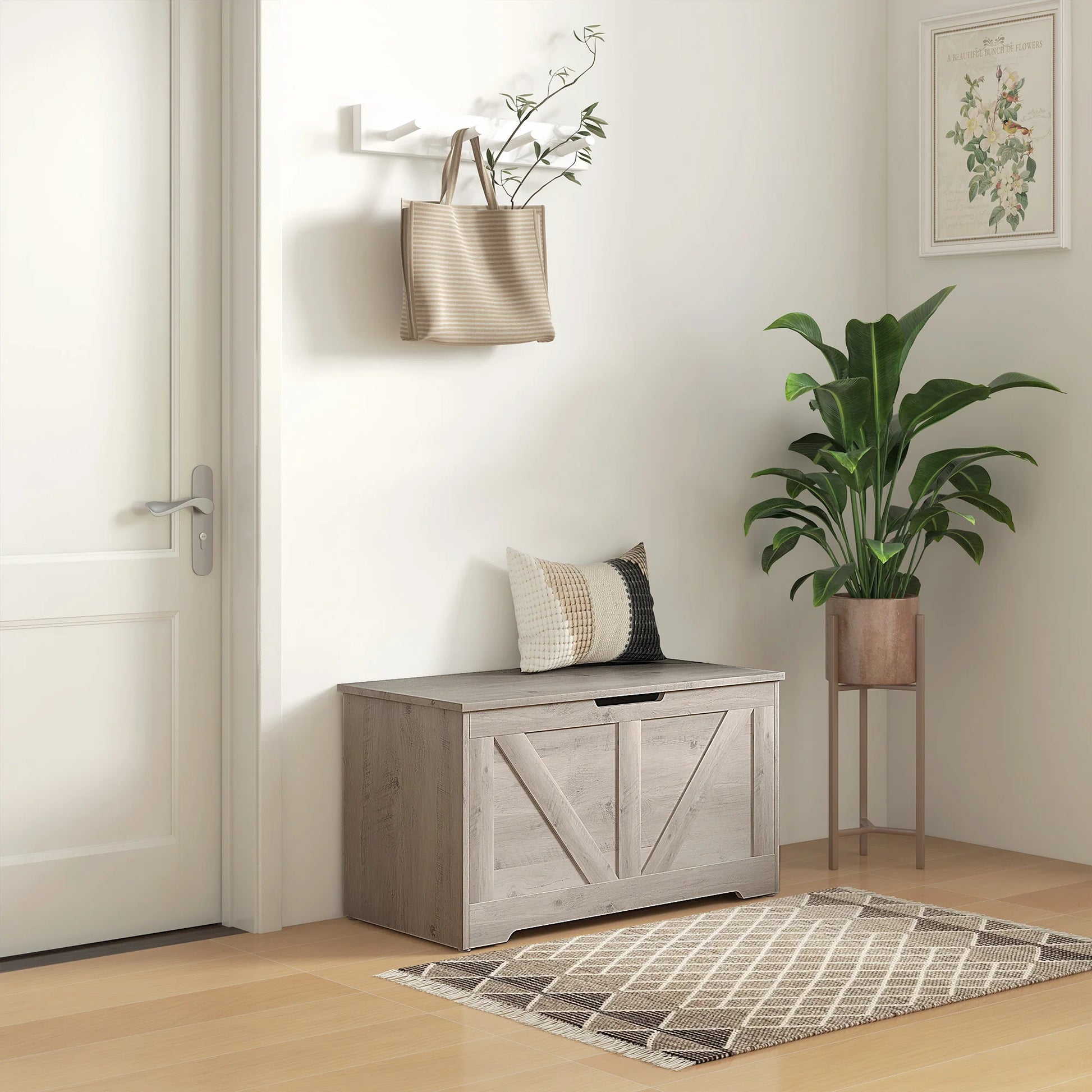 Entryway with a wooden bench, plant, and bag on a light wood floor.