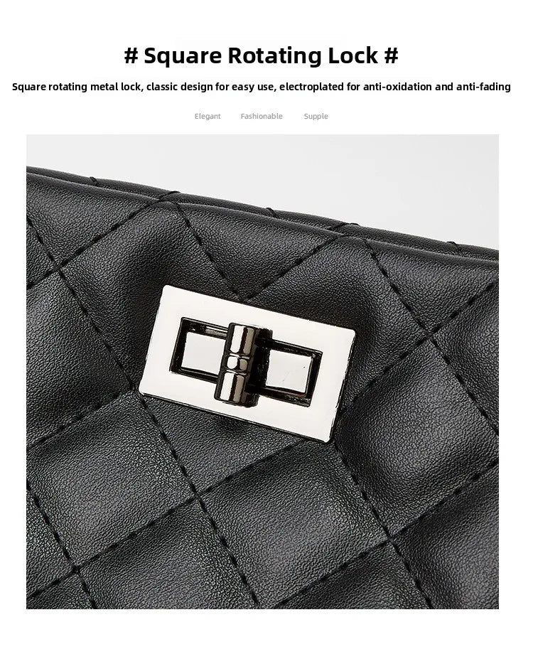 Black quilted handbag with a square rotating metal lock on a white background