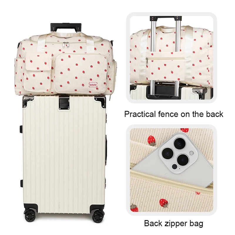 White suitcase with a polka dot bag on top, showing features like a practical fence and back zipper bag.