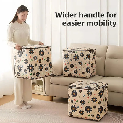 Woman holding a floral-patterned storage cube with text 'Wider handle for easier mobility' in a living room setting.