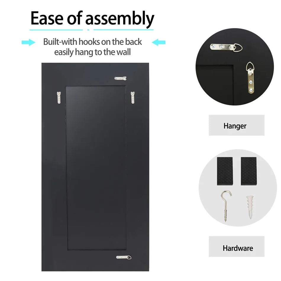 Black wall-mounted cabinet with hooks for assembly on a white background