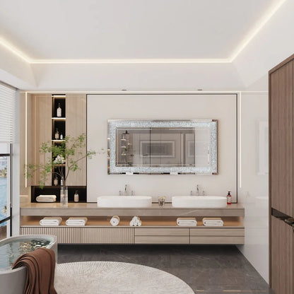 Modern bathroom with a vanity, mirror, and bathtub.