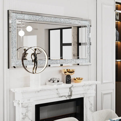 Decorative mirror with sparkling frame above a fireplace in a stylish room.